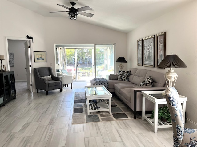 living room featuring lofted ceiling and ceiling fan