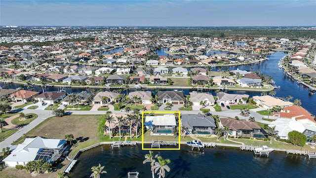 bird's eye view with a water view