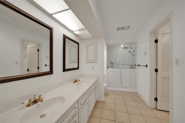 bathroom featuring walk in shower, tile patterned floors, toilet, and vanity