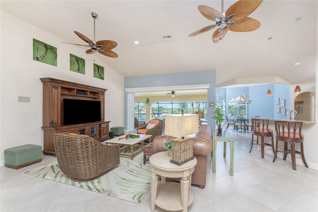 living room featuring high vaulted ceiling and ceiling fan