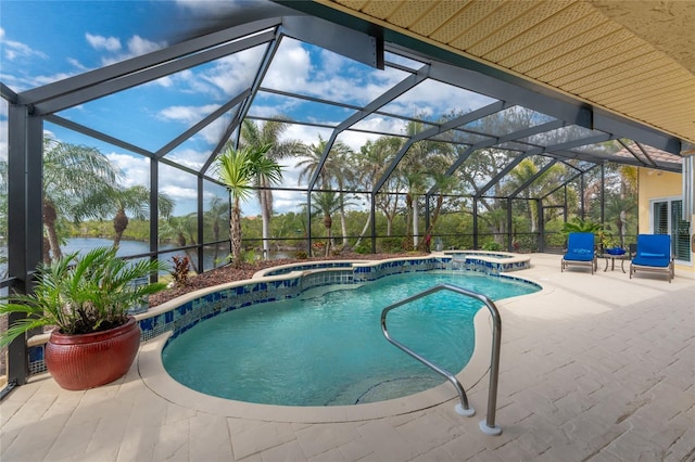 view of pool featuring a water view, an in ground hot tub, a lanai, and a patio