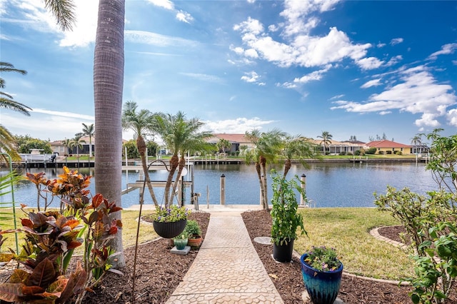 property view of water with a dock