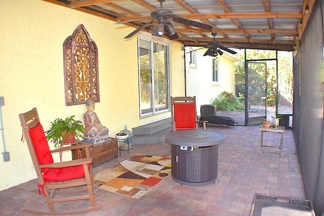 view of patio featuring ceiling fan