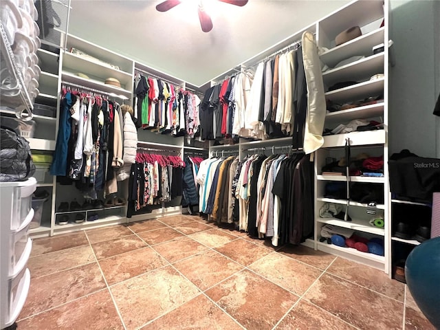 spacious closet with ceiling fan