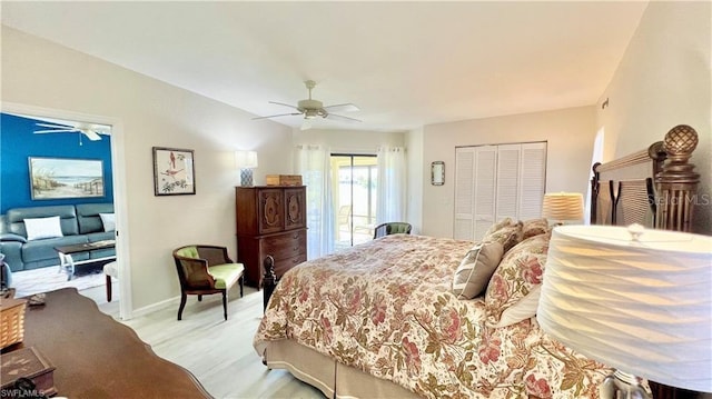 bedroom featuring ceiling fan, access to outside, a closet, and light hardwood / wood-style flooring