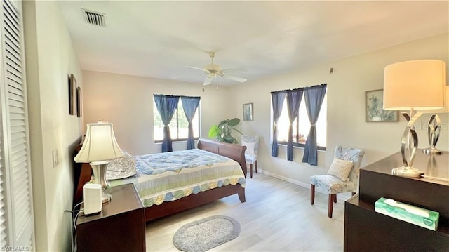 bedroom featuring ceiling fan and light hardwood / wood-style floors