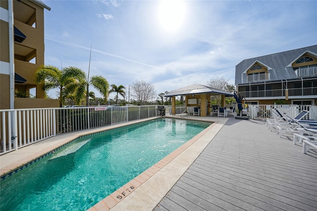 view of swimming pool with a gazebo and a patio