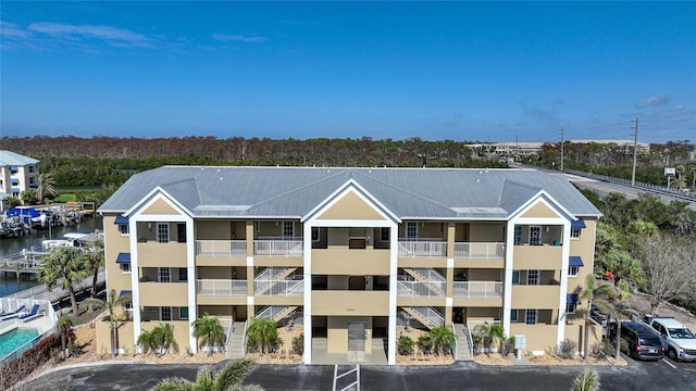 view of building exterior with a water view