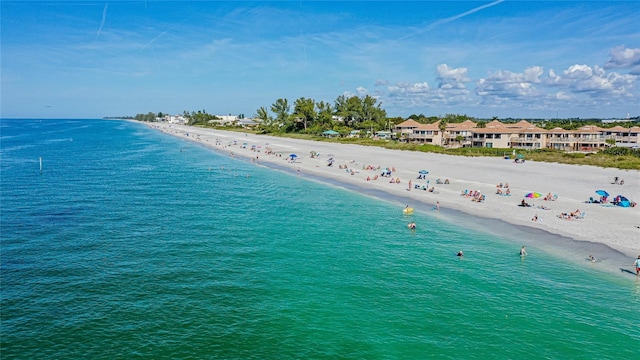 aerial view with a beach view and a water view