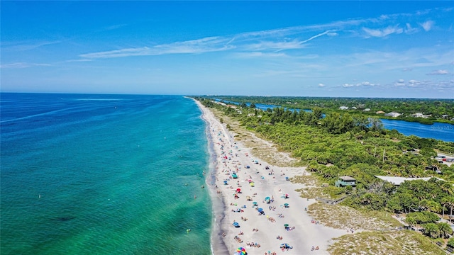 aerial view with a view of the beach and a water view