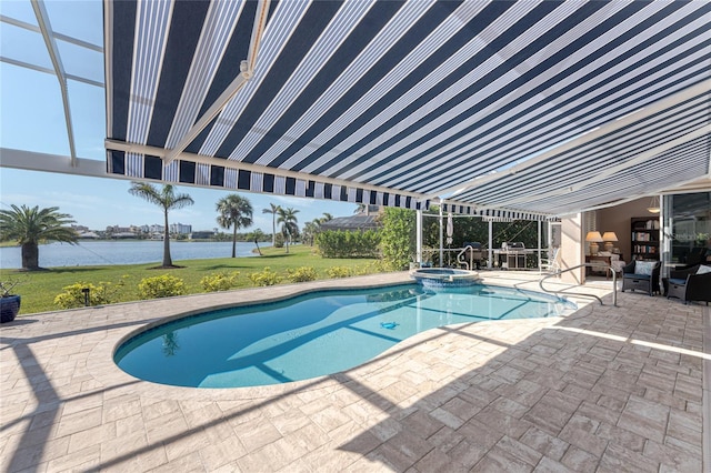 view of swimming pool featuring a water view, an in ground hot tub, and a patio