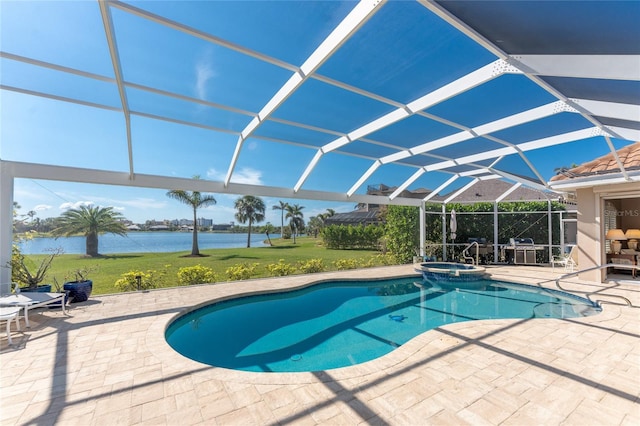 view of swimming pool featuring an in ground hot tub, a water view, glass enclosure, and a patio area