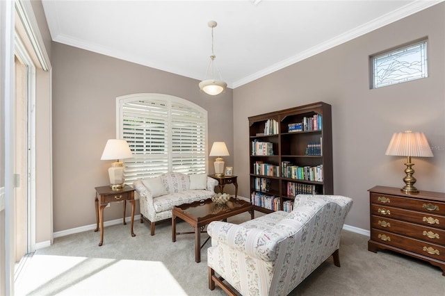 living area featuring light carpet and ornamental molding