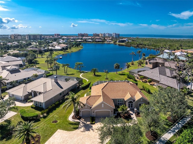 birds eye view of property featuring a water view