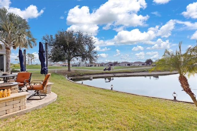 view of yard with a water view