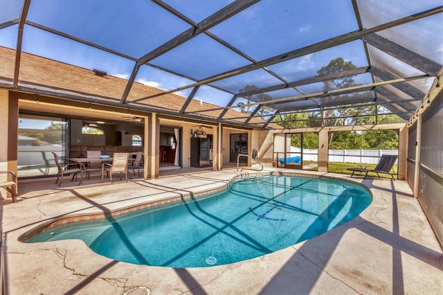 view of swimming pool with a fenced in pool, a patio, and fence