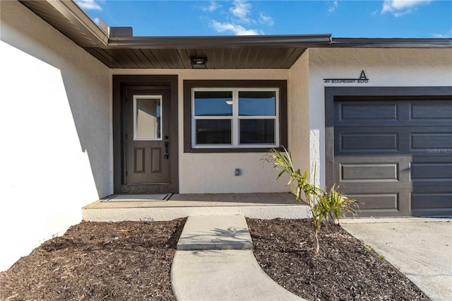 property entrance featuring a garage