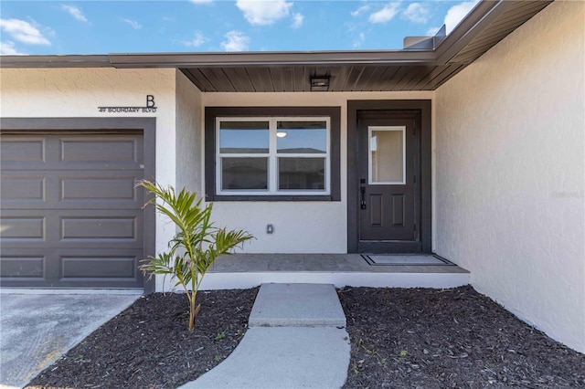 entrance to property with a garage