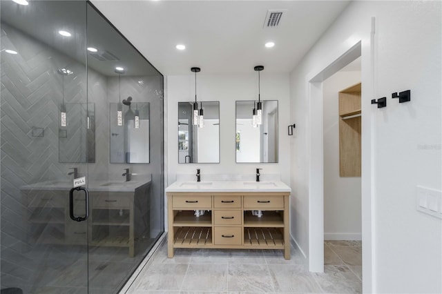 bathroom with vanity and an enclosed shower