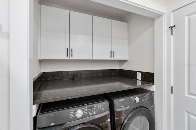 laundry room with separate washer and dryer