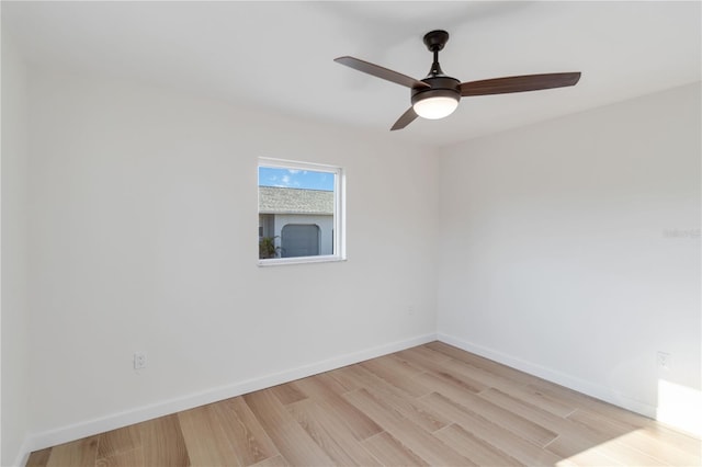 unfurnished room featuring ceiling fan and light hardwood / wood-style flooring