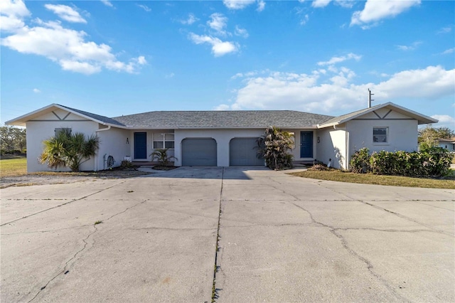 single story home featuring a garage