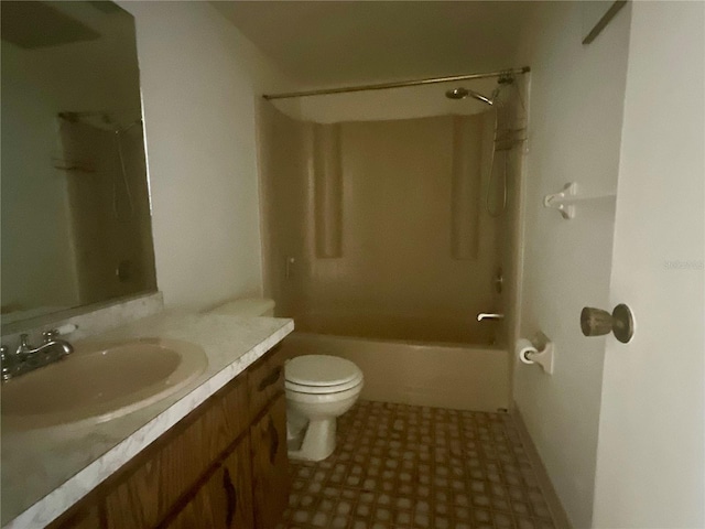 full bathroom with vanity, washtub / shower combination, and toilet