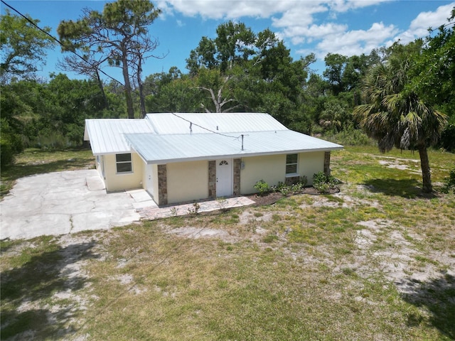 view of home's exterior featuring a yard