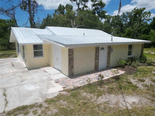 view of front of home with a patio