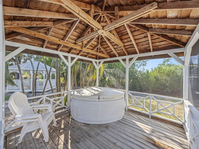 wooden deck featuring a gazebo