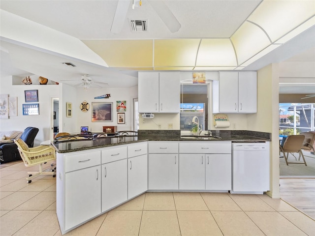 kitchen with ceiling fan, dishwasher, sink, and white cabinets