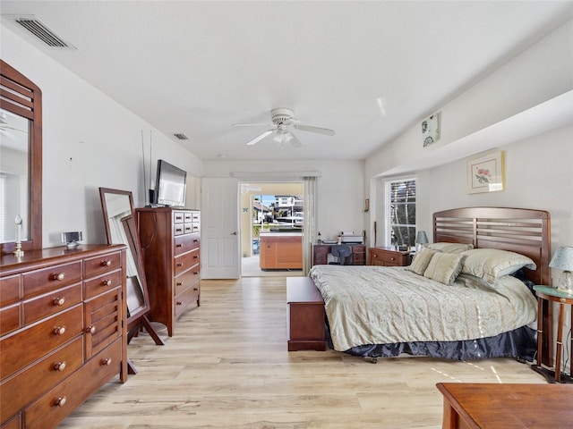 bedroom featuring light hardwood / wood-style flooring and ceiling fan