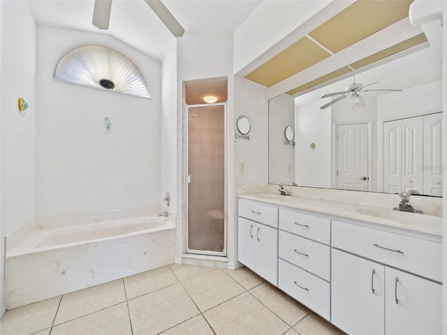 bathroom with tile patterned flooring, plus walk in shower, vanity, and ceiling fan