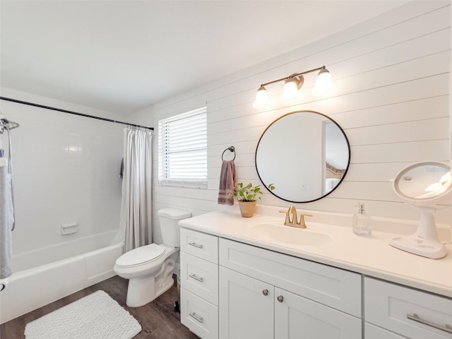 full bathroom with shower / bath combination with curtain, vanity, toilet, and hardwood / wood-style floors