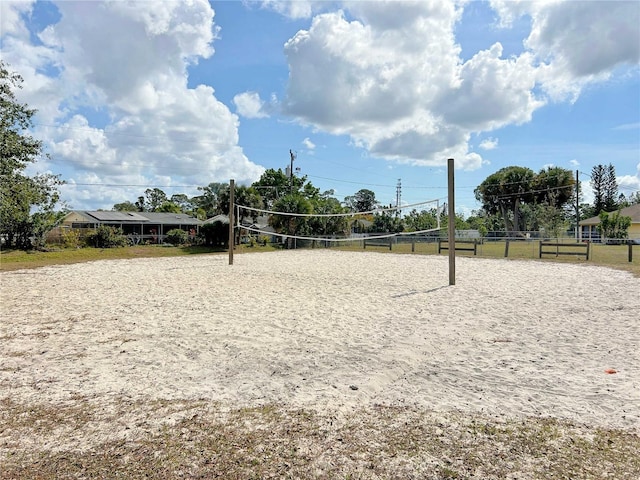 view of home's community featuring volleyball court