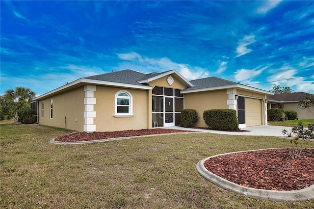 view of front of house with a garage and a front yard