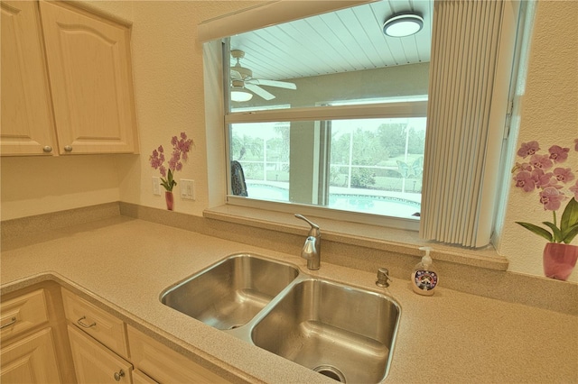 kitchen with sink and ceiling fan