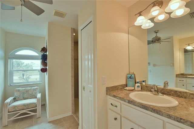 bathroom with vanity, tile patterned floors, and ceiling fan