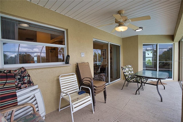 view of patio / terrace featuring ceiling fan