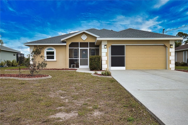 single story home with a garage and a front yard