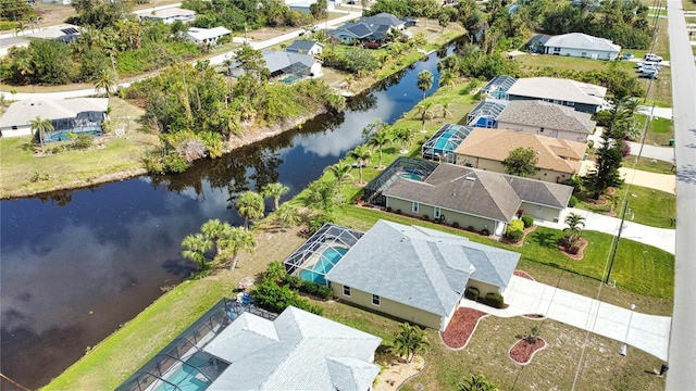 drone / aerial view with a water view