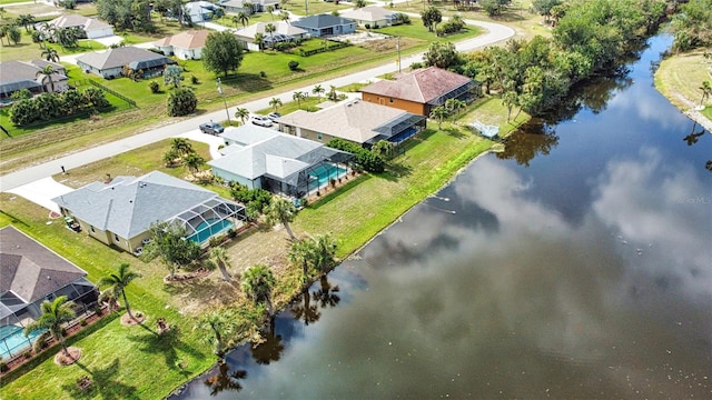 drone / aerial view with a water view