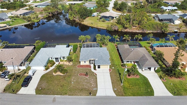 bird's eye view with a water view