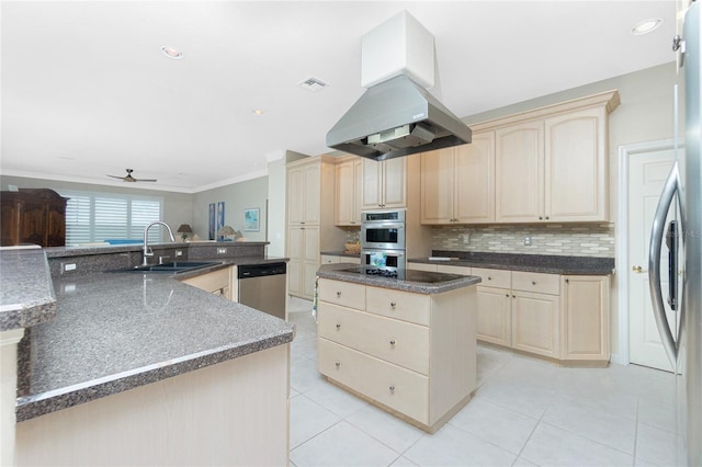 kitchen with appliances with stainless steel finishes, light brown cabinetry, sink, island exhaust hood, and a center island