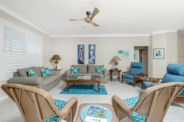 living room featuring ornamental molding, light tile patterned floors, and ceiling fan