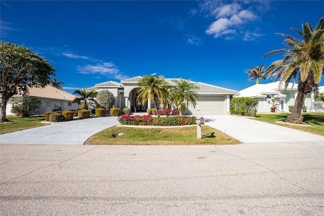 view of front of property featuring a garage