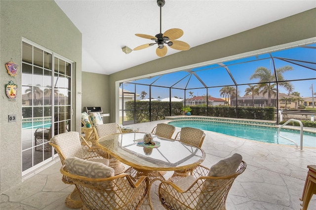 view of swimming pool featuring ceiling fan