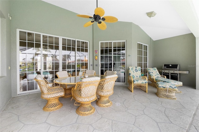 sunroom / solarium with vaulted ceiling and ceiling fan