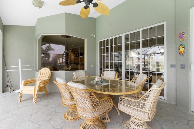 sunroom / solarium with ceiling fan