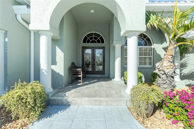 doorway to property featuring french doors